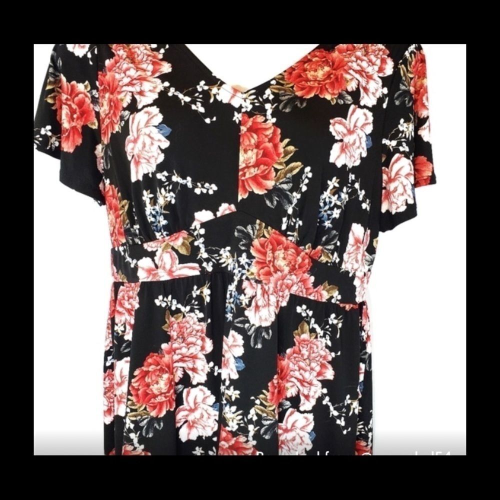 TORRID BLACK FLORAL JERSEY‎ KNIT PEPLUM TOP